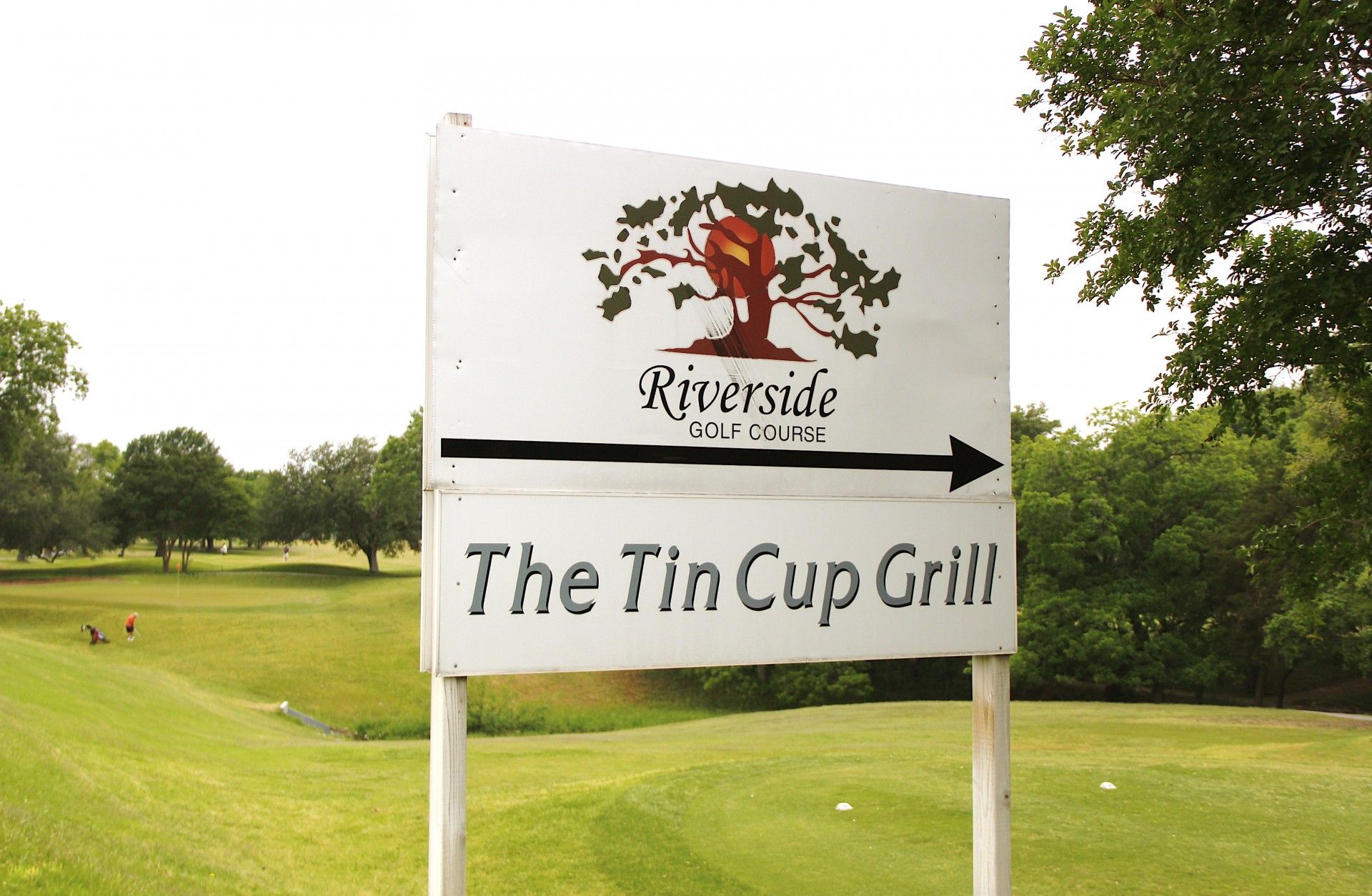 The Tiny Cup Grill  restaurant sign