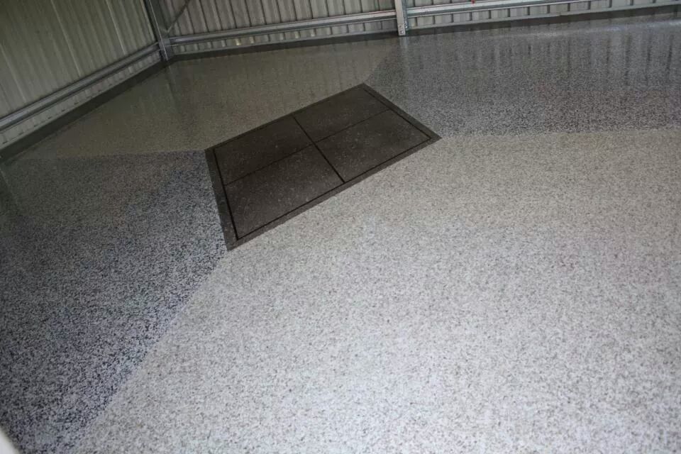 Worker Coating Epoxy — Concrete Service in Townsville, QLD