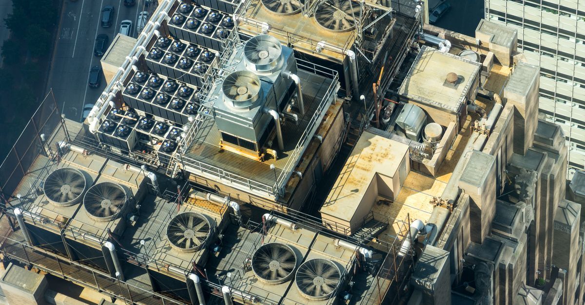 Commercial rooftop HVAC and mechanical systems on a building.
