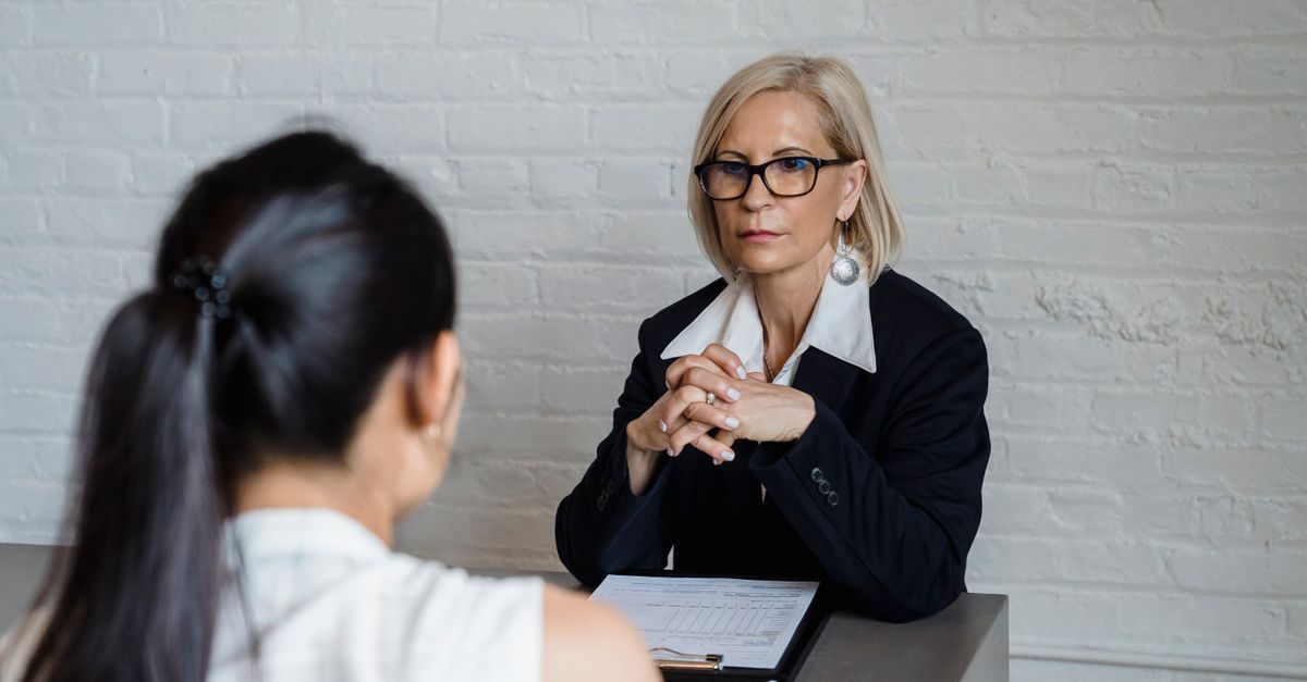 Business coach working with a client during a consulting session.