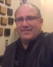 A logo for a company called sertoma on a white background.