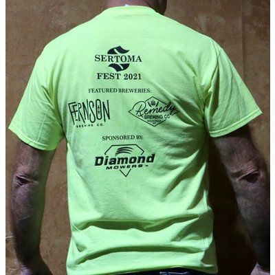 A man is wearing a neon green shirt that says sertoma fest 2021