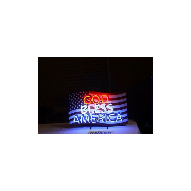 A neon sign that says `` god bless america '' is sitting on a table.