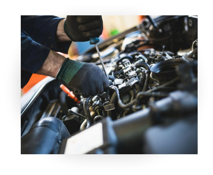 Mechanic Working With Engine | Ormsby Auto