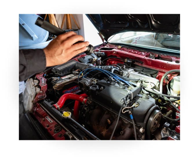 Mechanic Working With Engine | Ormsby Auto