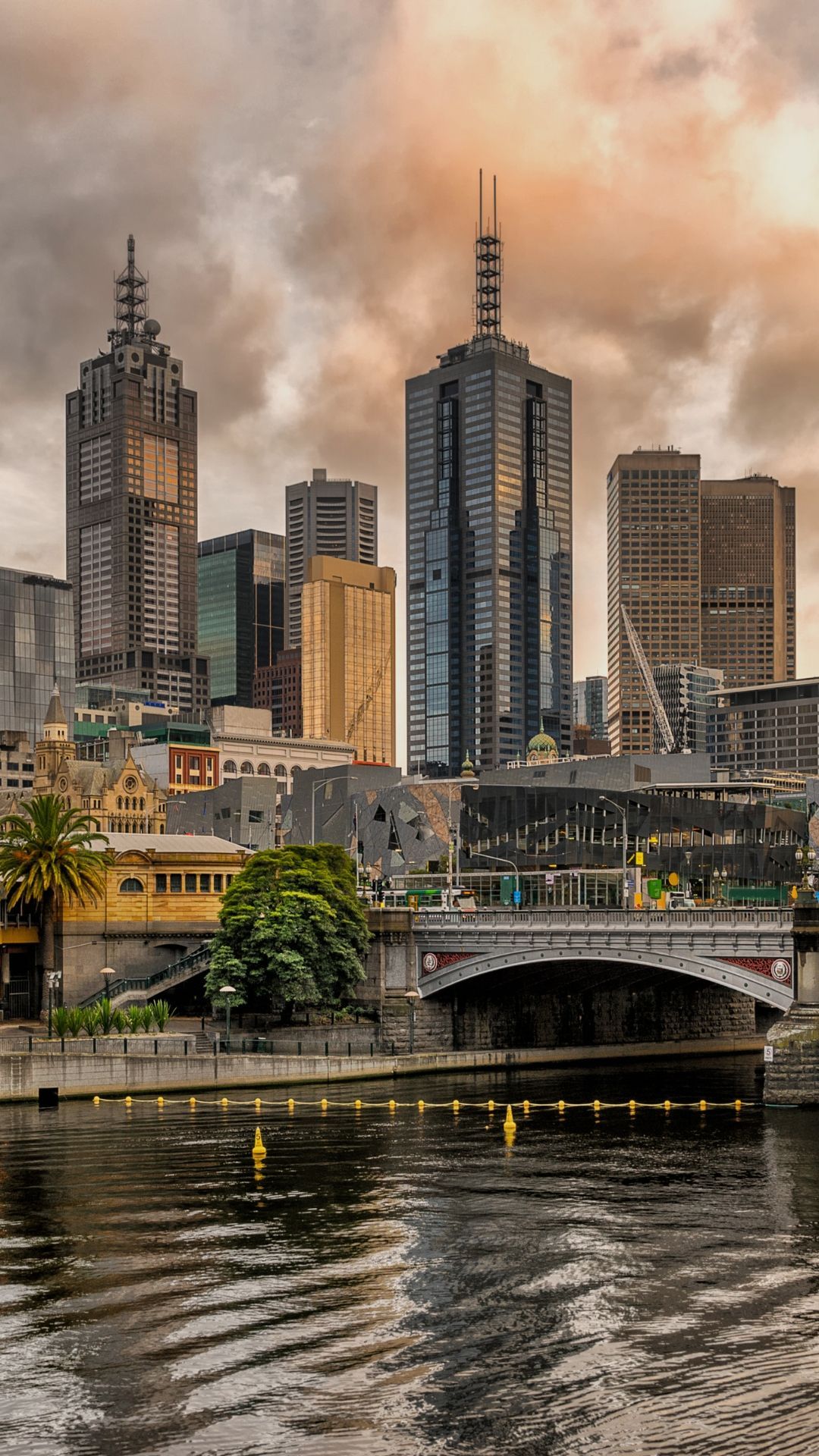 Melbourne Skyline at Sunset, With Buildings Reflecting in the River  — Slack-Smith Partners in Melbourne, VIC