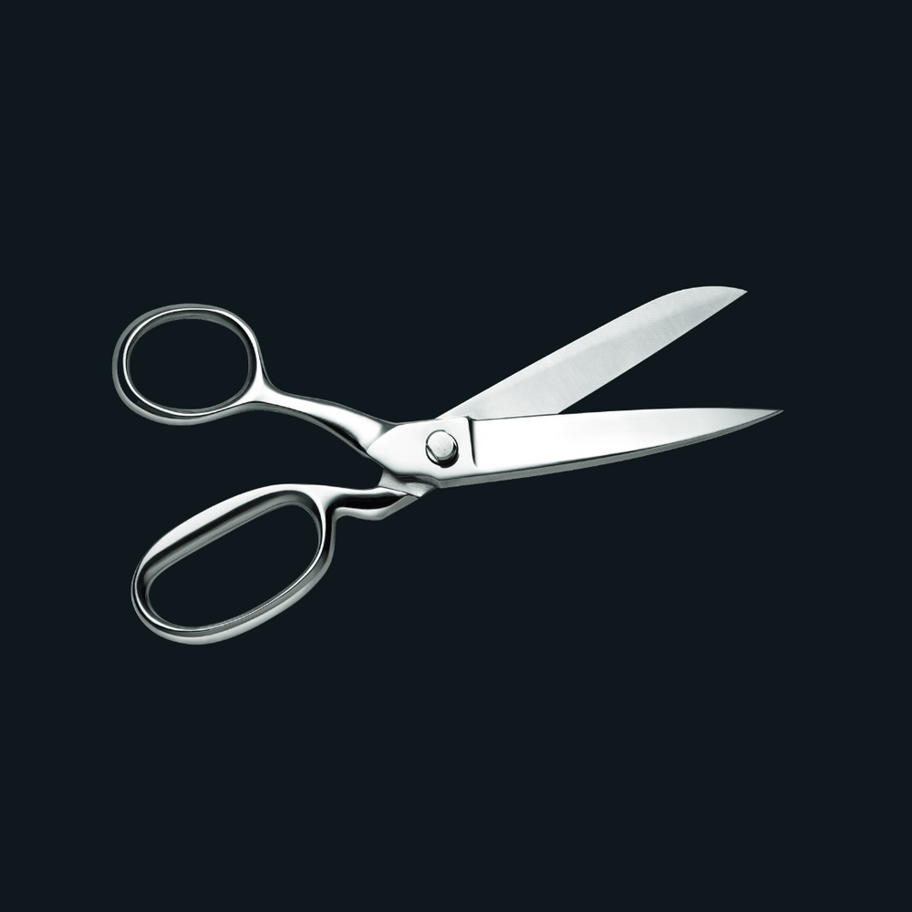 A Pair of Silver Scissors on A Black Background — Slack-Smith Partners in Tamworth, NSW