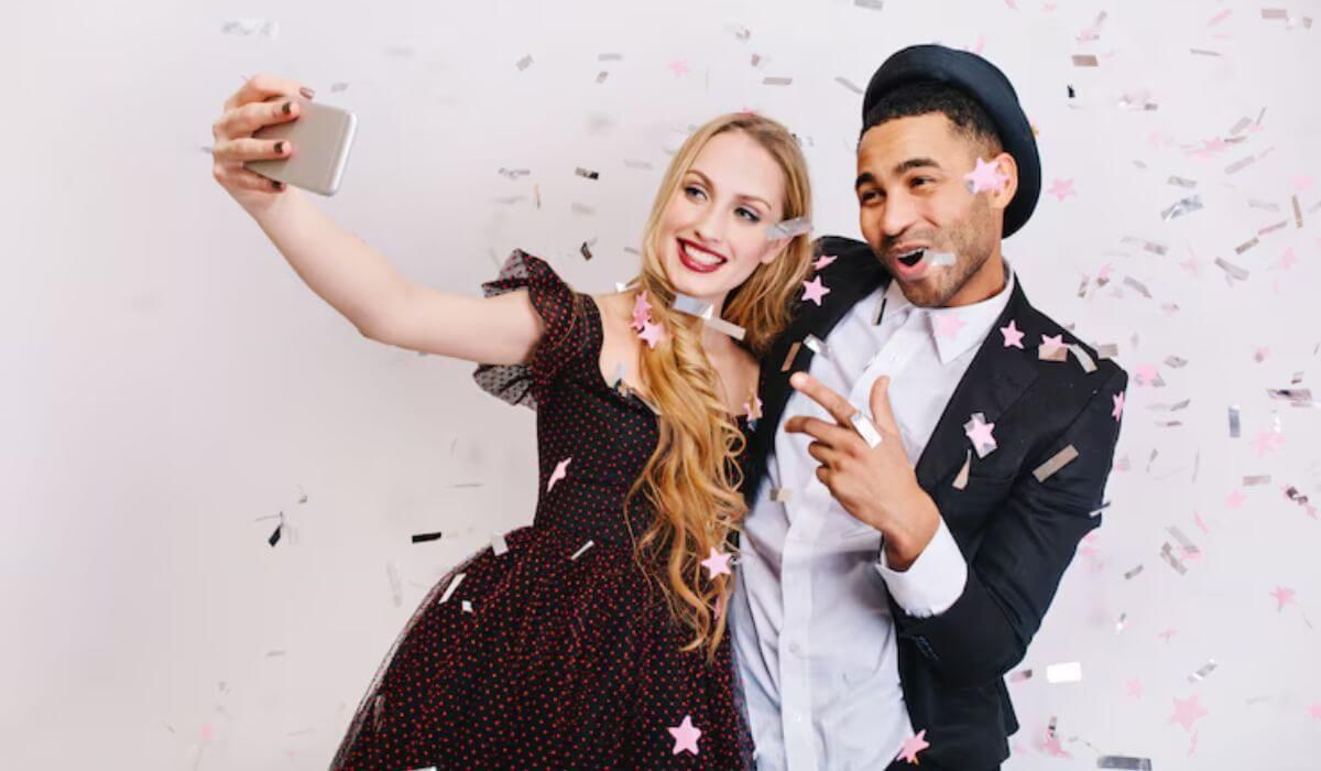 wedding guests using photo booth