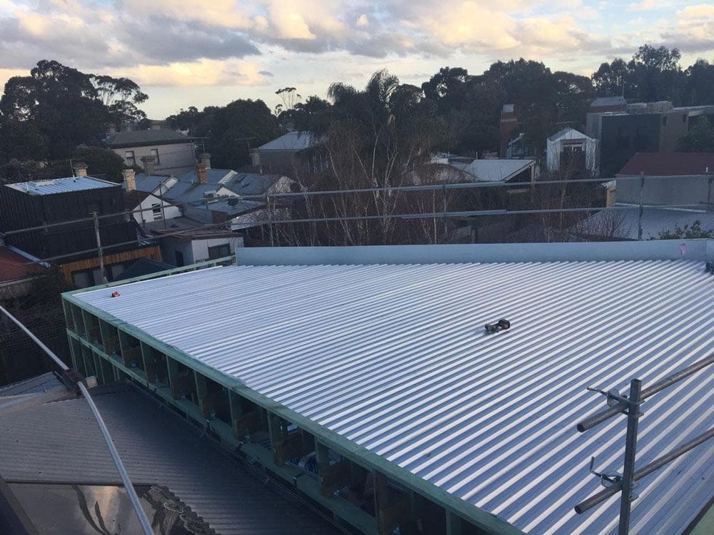 Installing Metal Roof — Roofing Contractors in Winnellie, NT