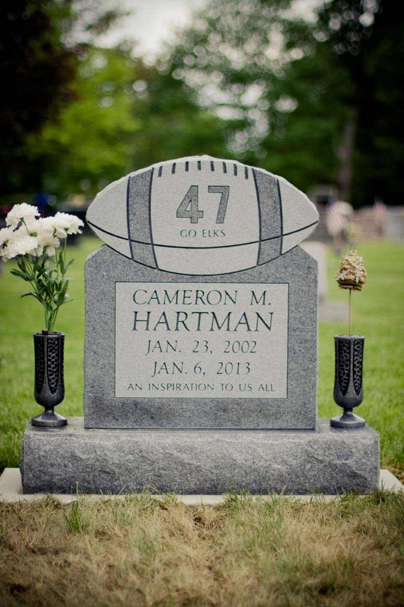 Grave Markers — Gravestone with Football in Columbus, Oh