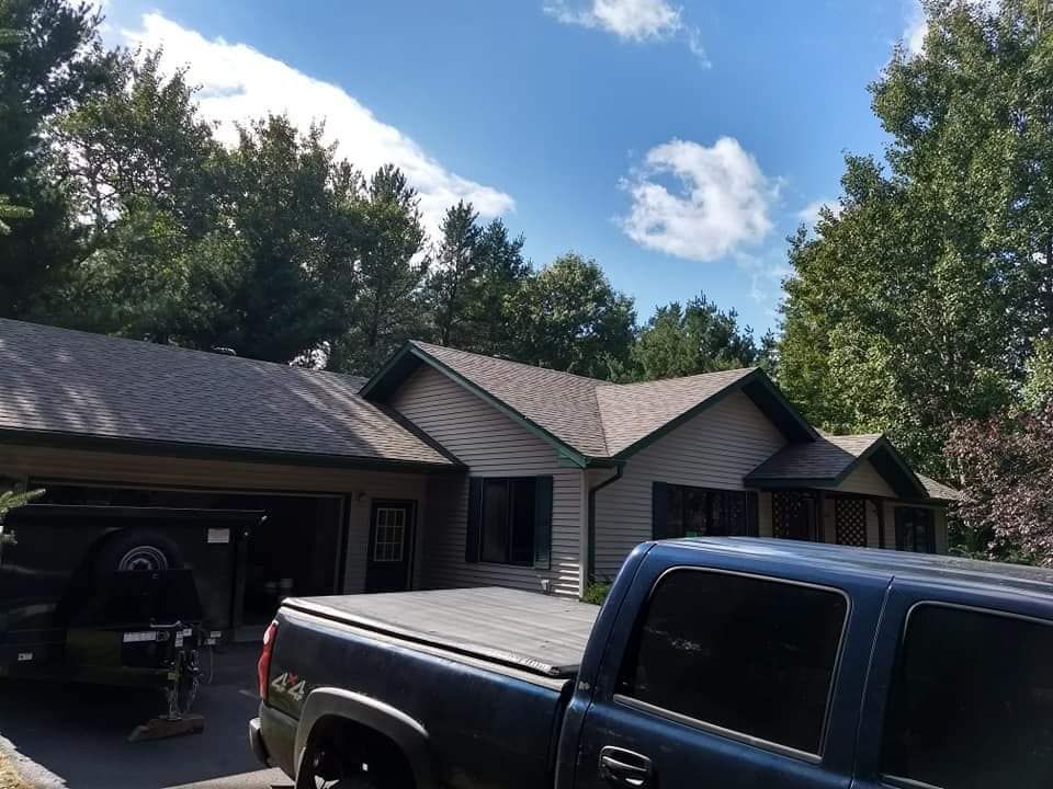 House And Car — Clayton, WI — Stuivenga Roofing