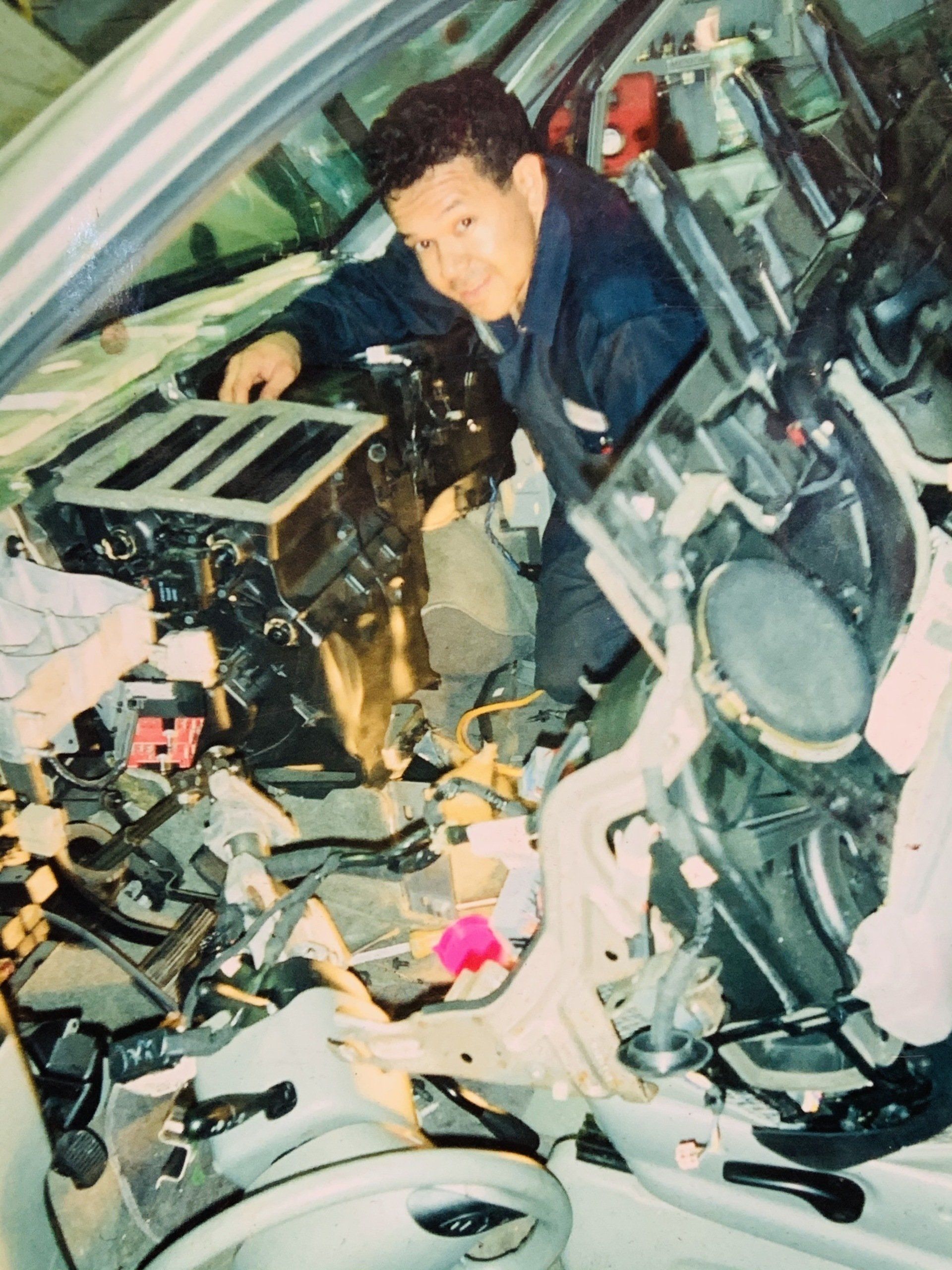 carlos working on car interior