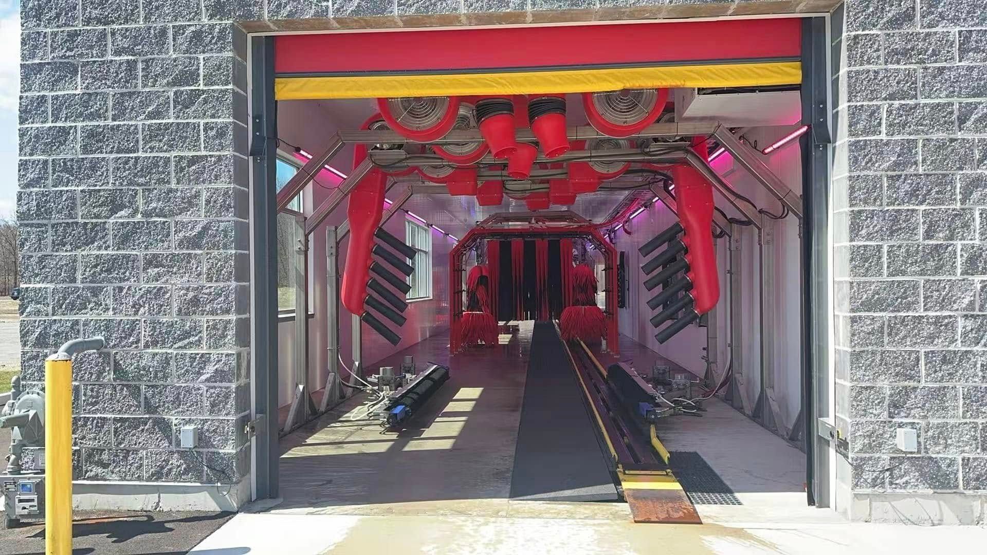The inside of a car wash with the door open