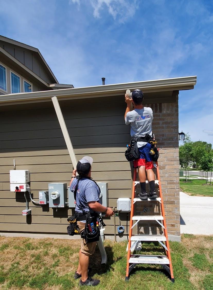 downspout repairs in Buda, Tx