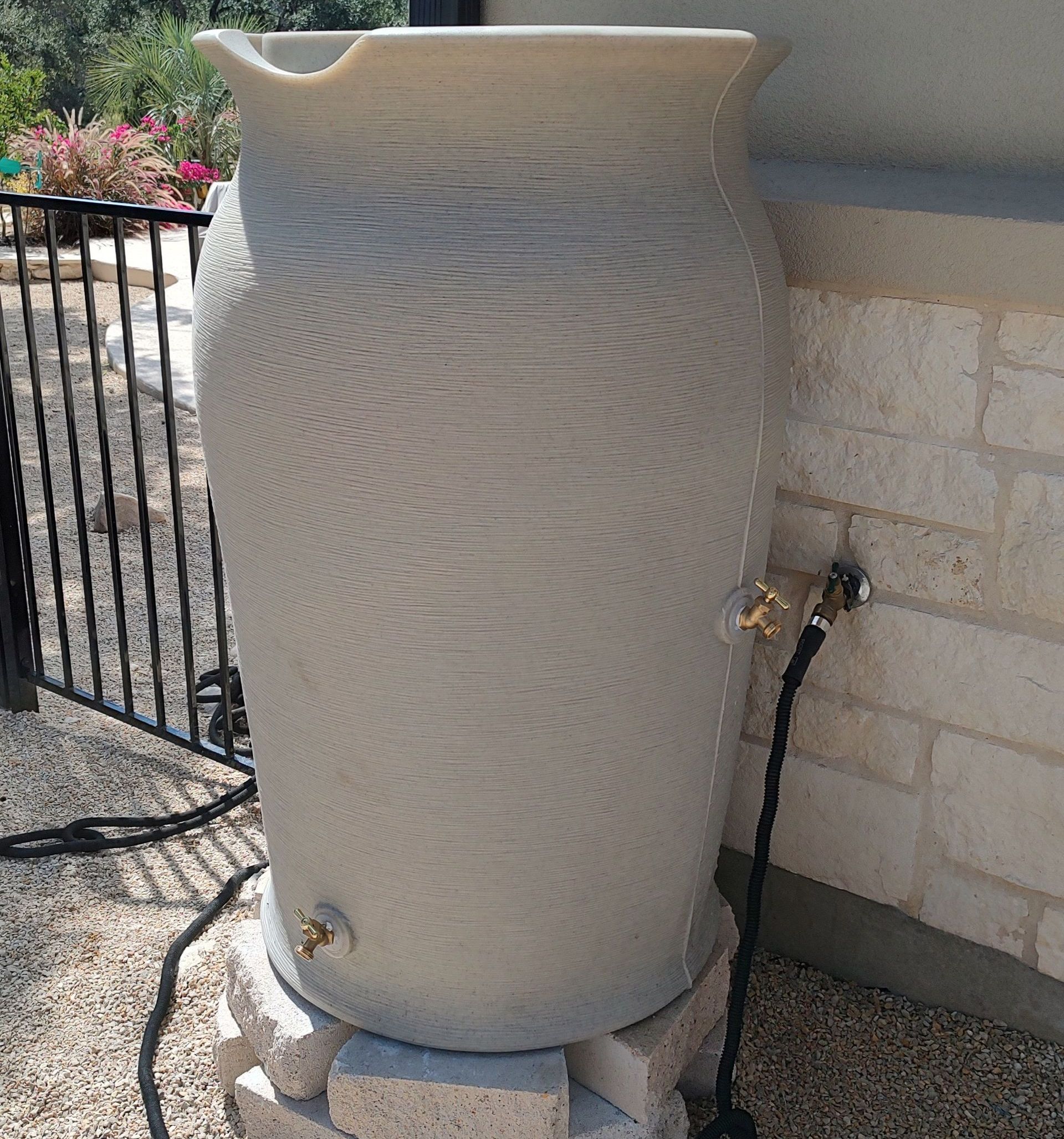 gray aesthetic rain water collection system in austin tx