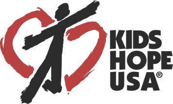 Kids Hope USA logo with stylized black figure and red heart shape on white background