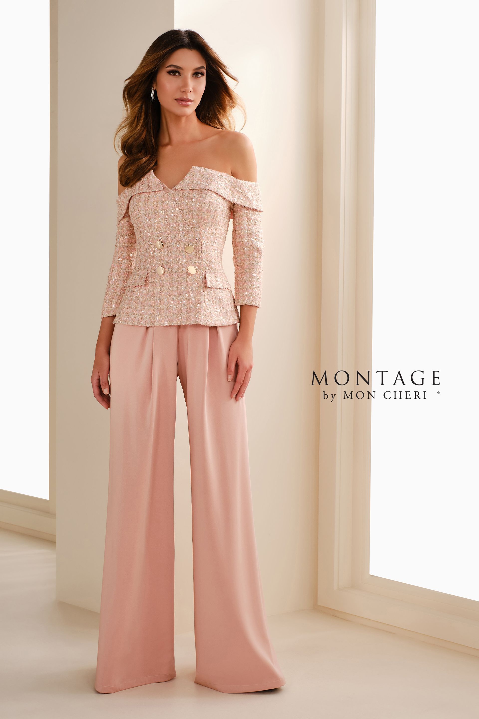 Woman wearing a pink off-shoulder sequined top and palazzo pants.