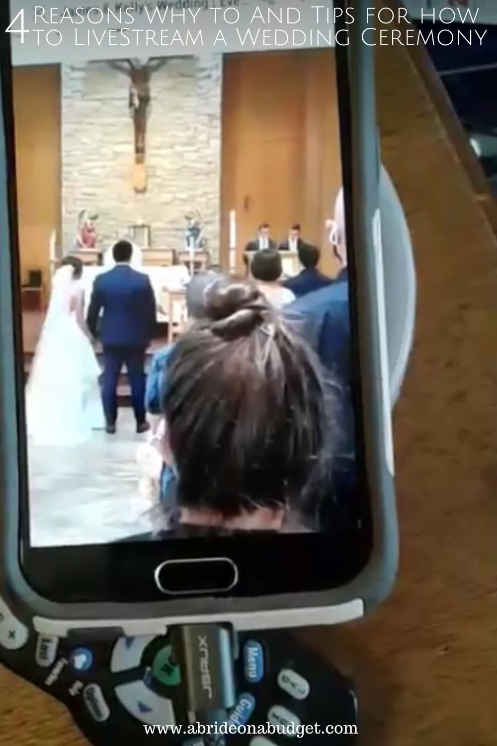 Smartphone livestreaming a wedding ceremony in a church; couple at the altar.