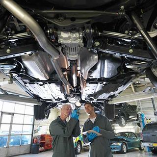 Two Mechanic Checking The Car — Niles, MI — Precision Auto Repair,Body , Towing