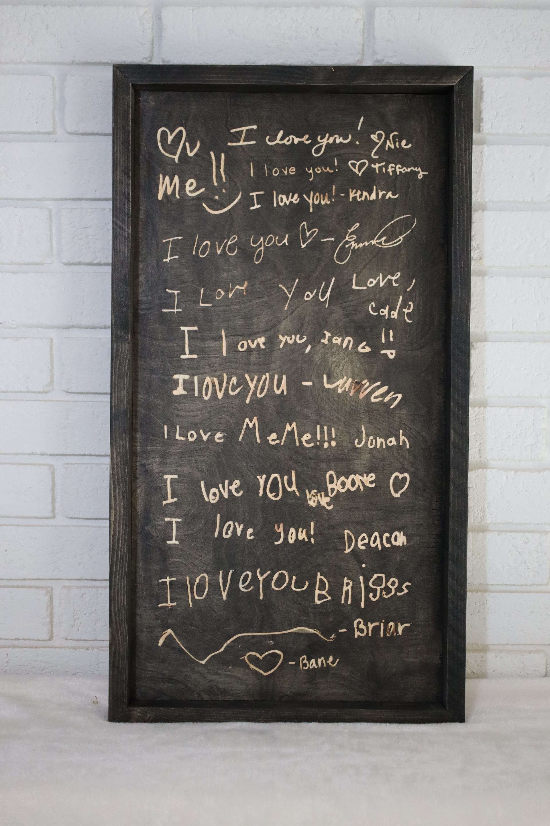 Pink planner and calendar, with a 1040 tax form, and lettered plan.