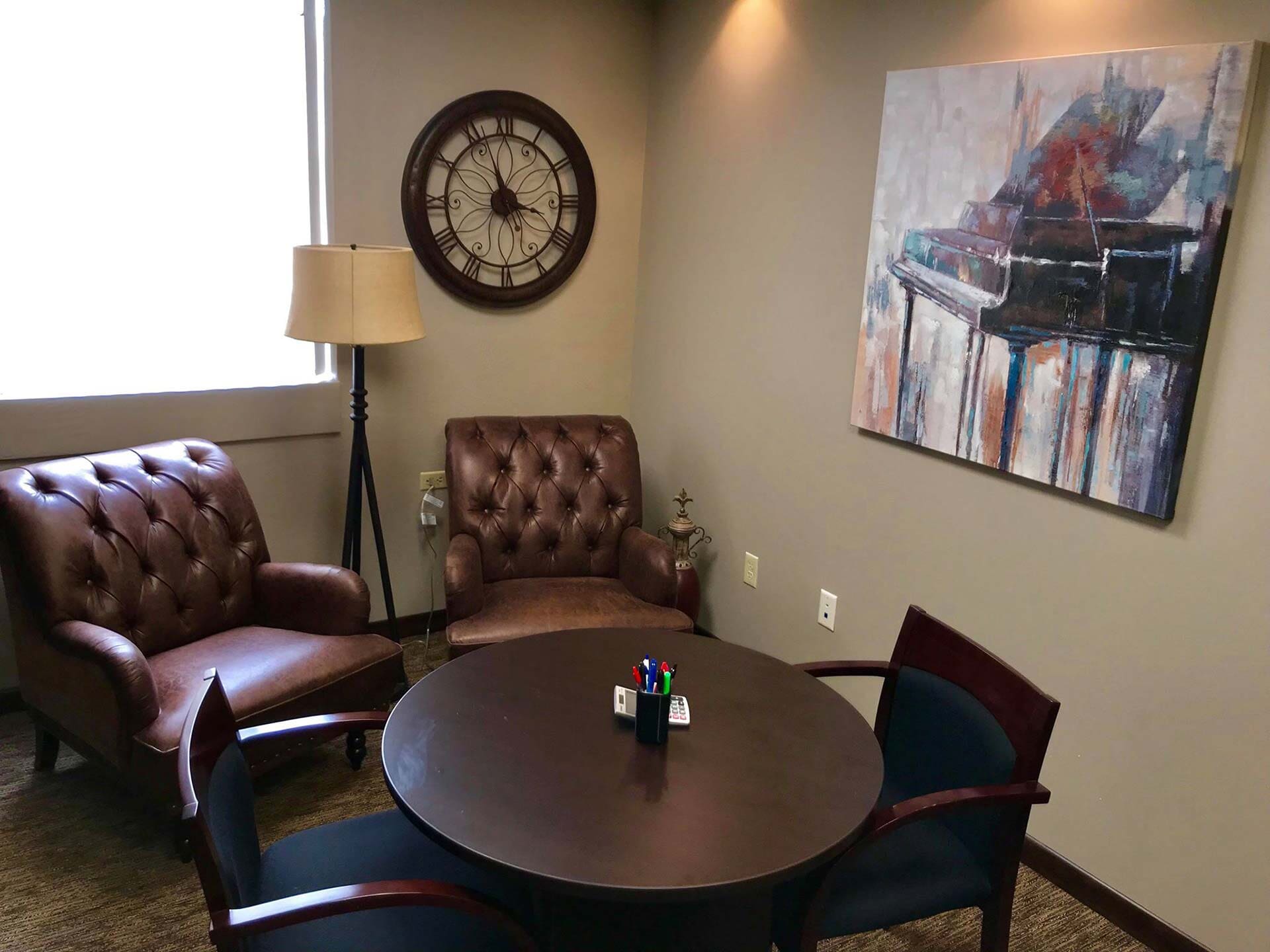 Chairs and Piano Wall Decor — Marion, IL — Michelle M. Schafer Attorney At Law, LLC