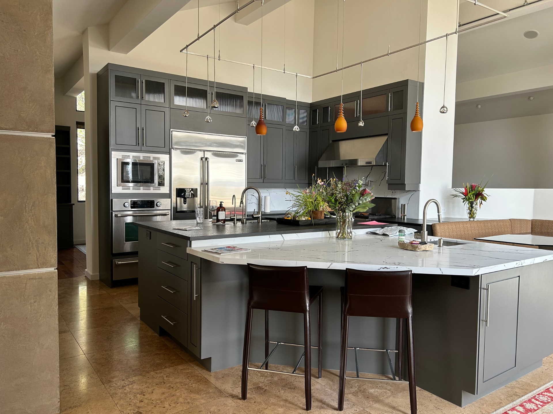 Picture of kitchen cabinets painted white.