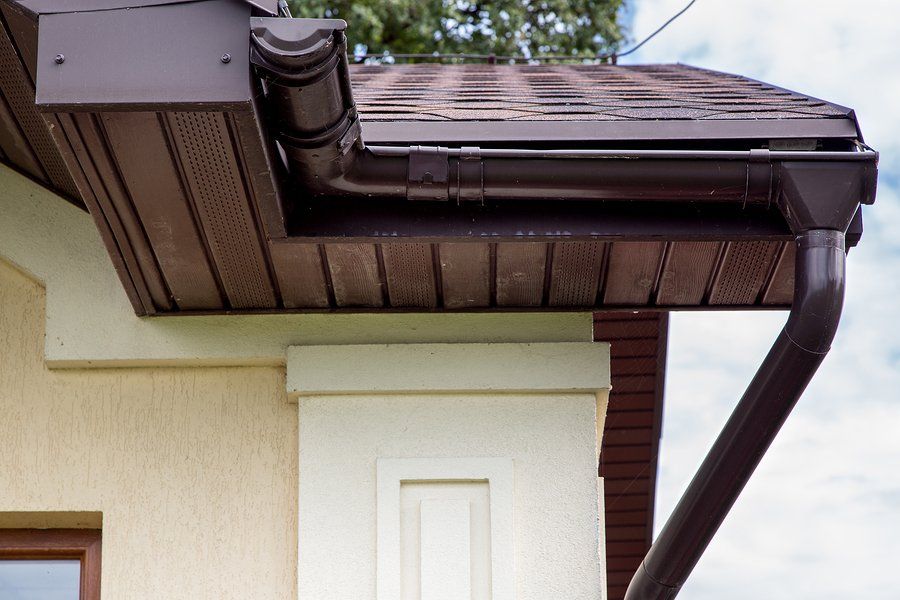a house roof with gutter system