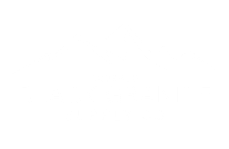 A logo for the colorado river company with a mountain in the background