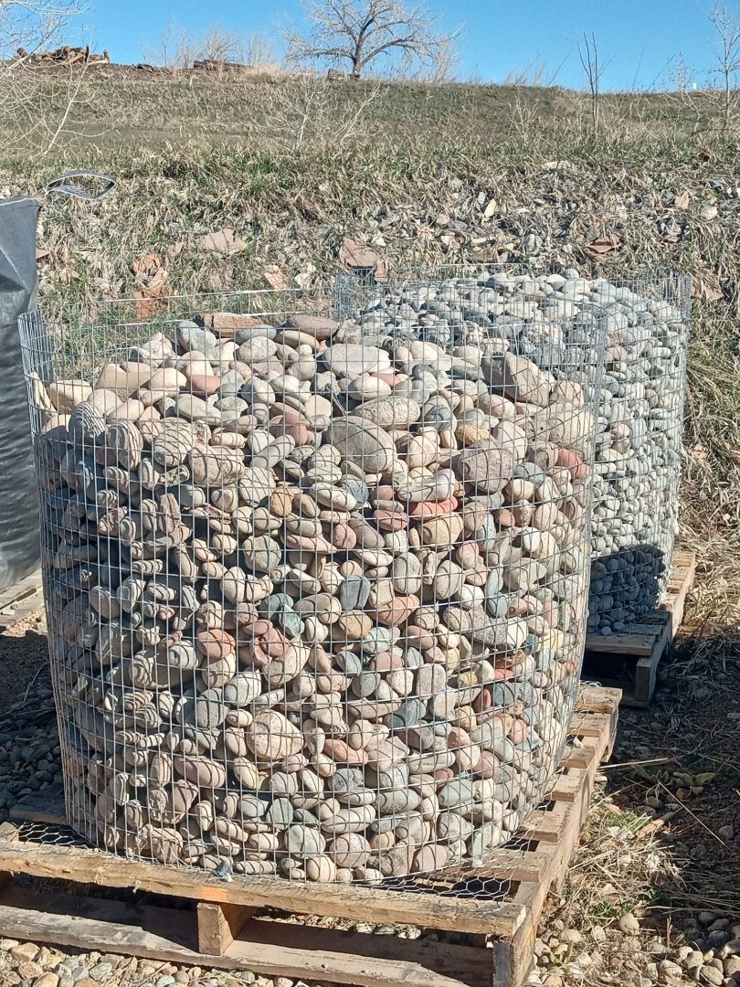 A pile of rocks sitting on top of a wooden pallet.