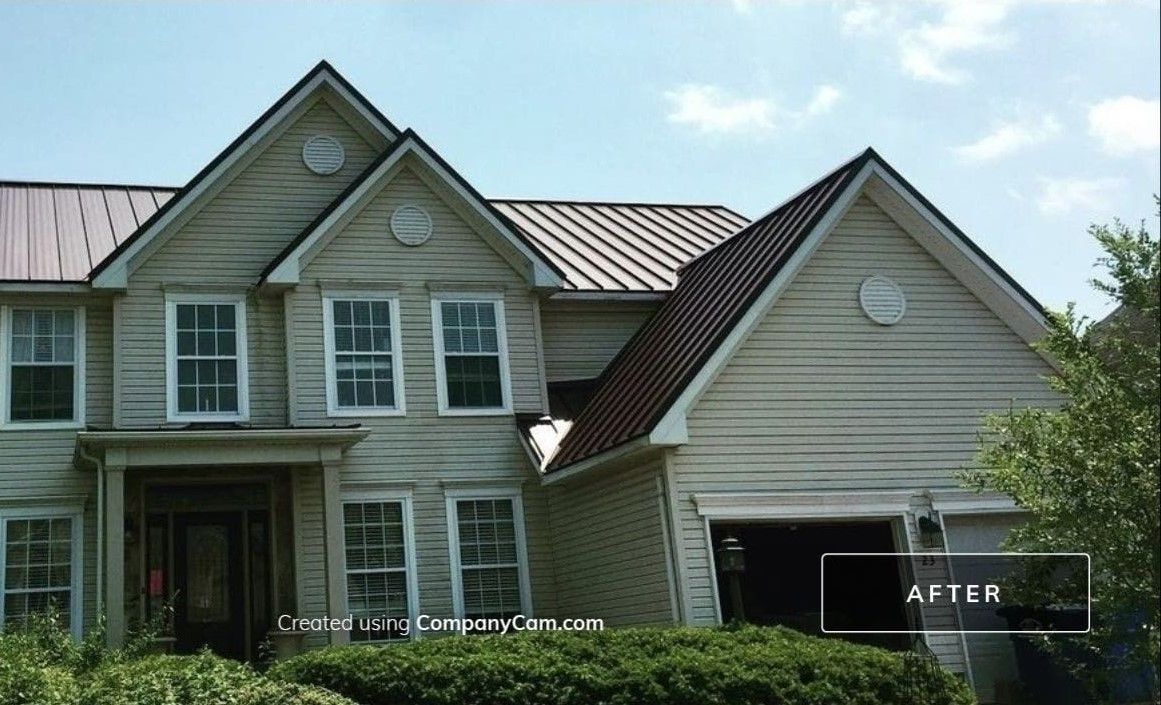 A house with a red roof has a picture of it after being remodeled