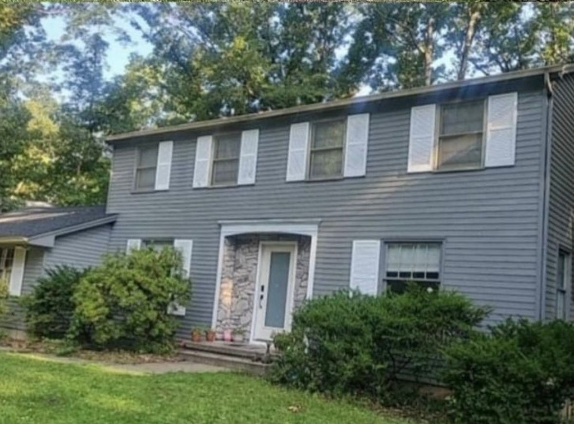 A before and after photo of a white garage