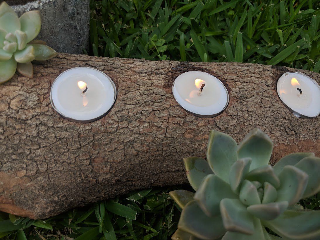 Tealights in a log
