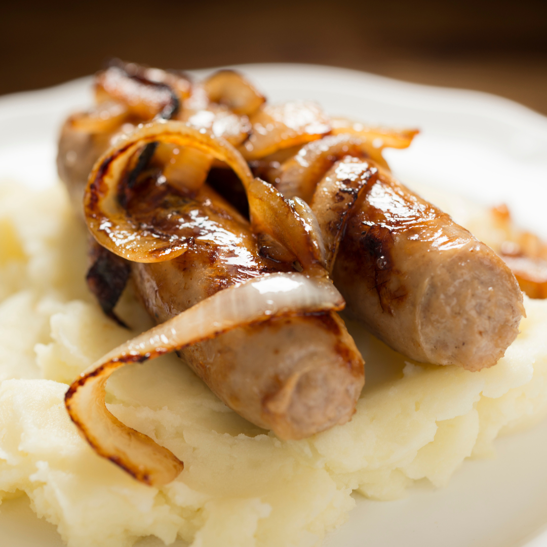 Bangers and mash with onions and gravy