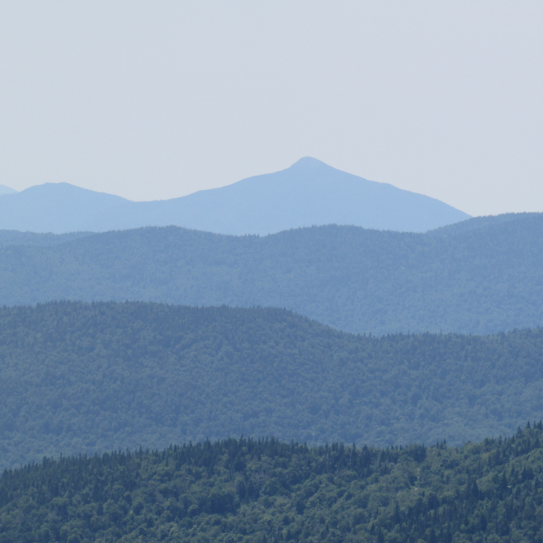 Landscape of layered green mountains in Vermont.