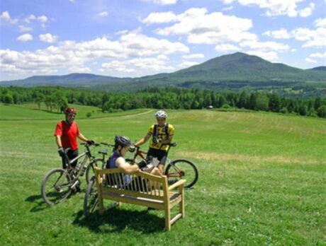 Mountain bikers catch their breath at The Wildflower's Heaven's Bench