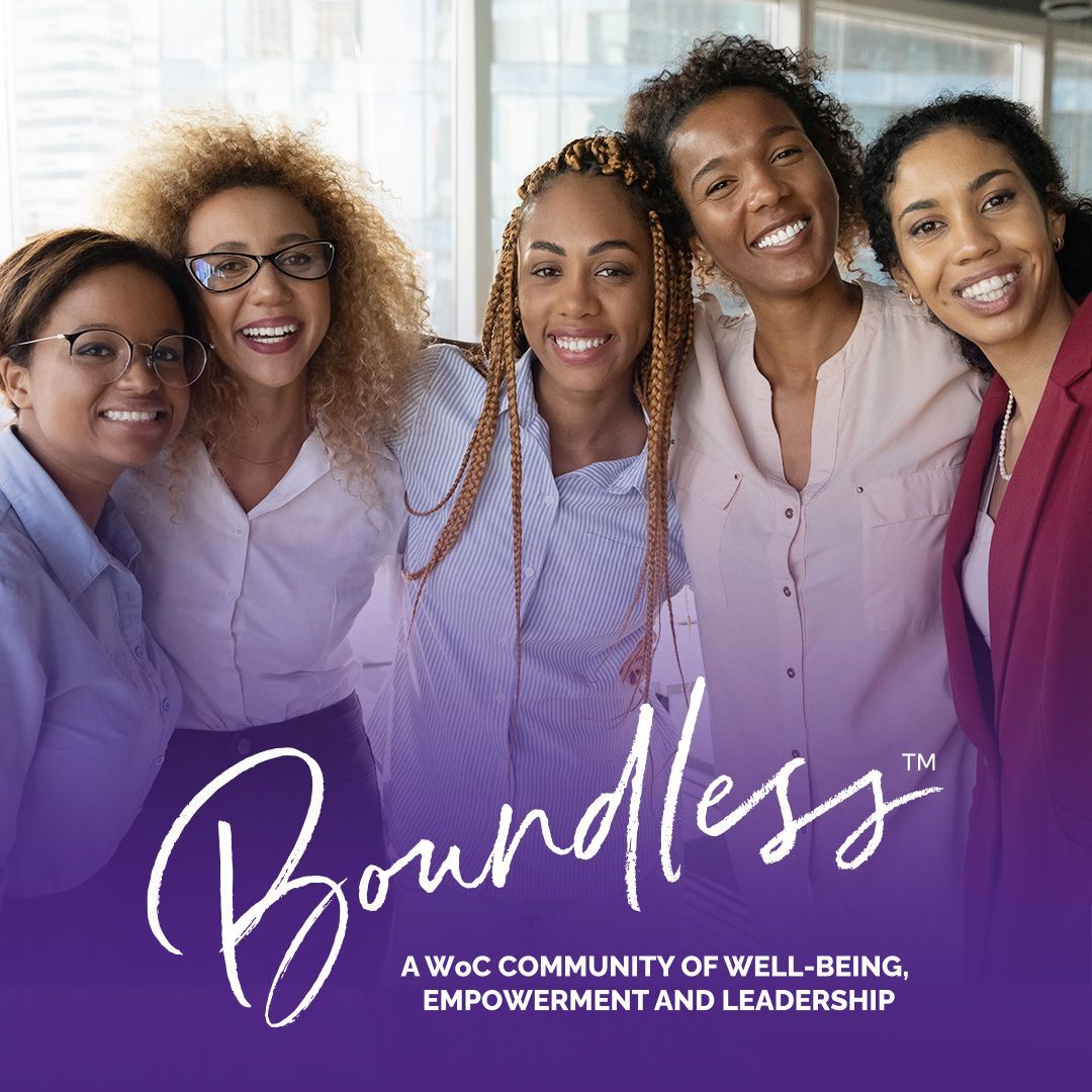 Five smiling women embracing;