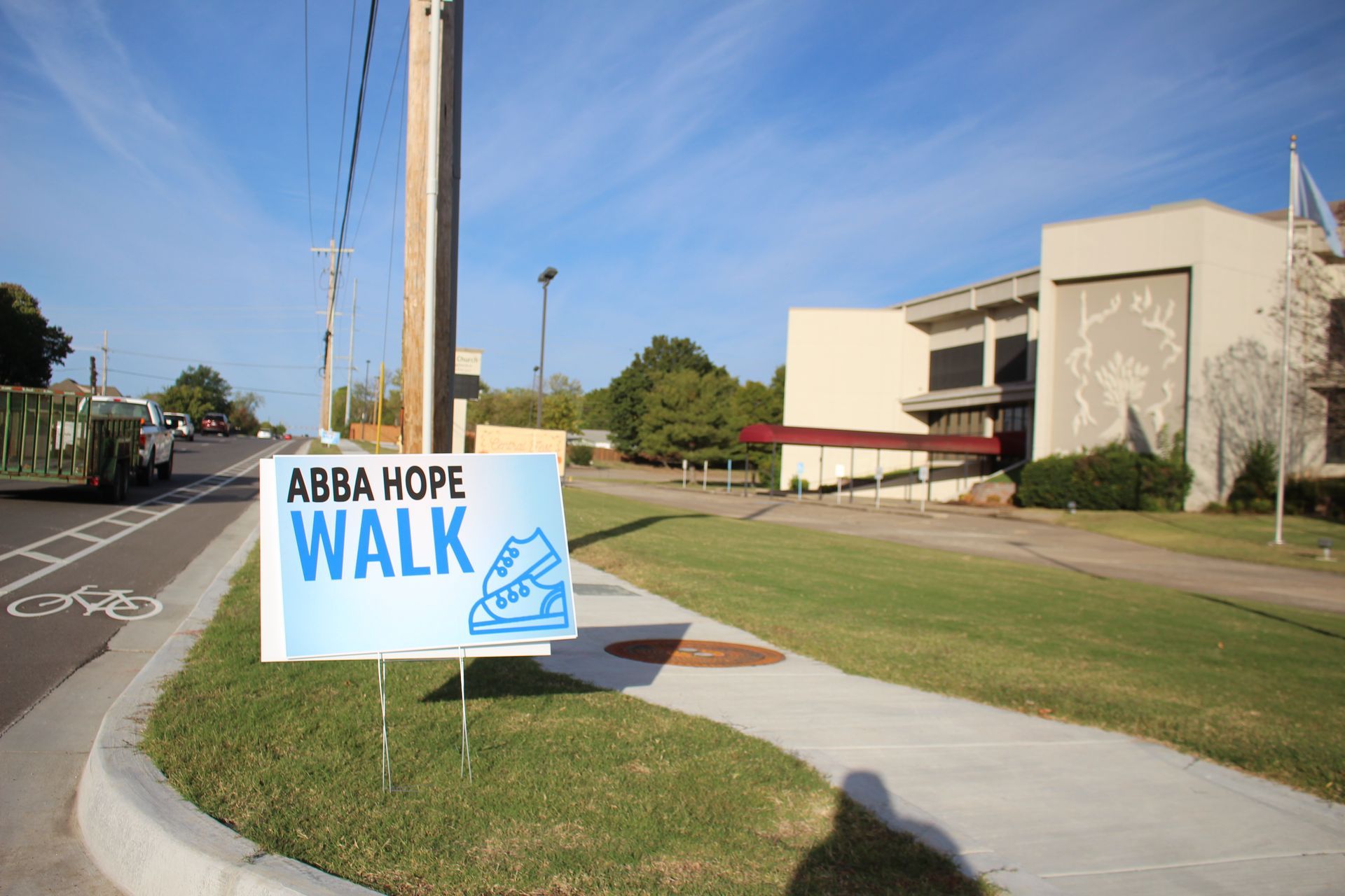 A sign that says abba hope walk on it