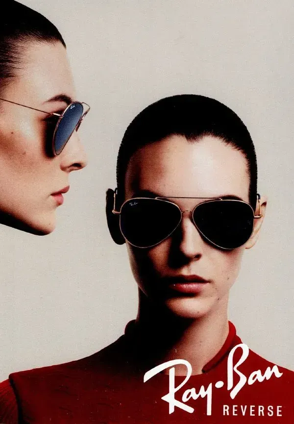 A woman wearing ray-ban sunglasses on a poster