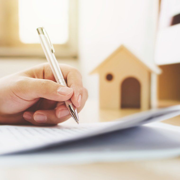 Signing Real Estate Form — Roxboro, NC — Grissom & Holloman, PC