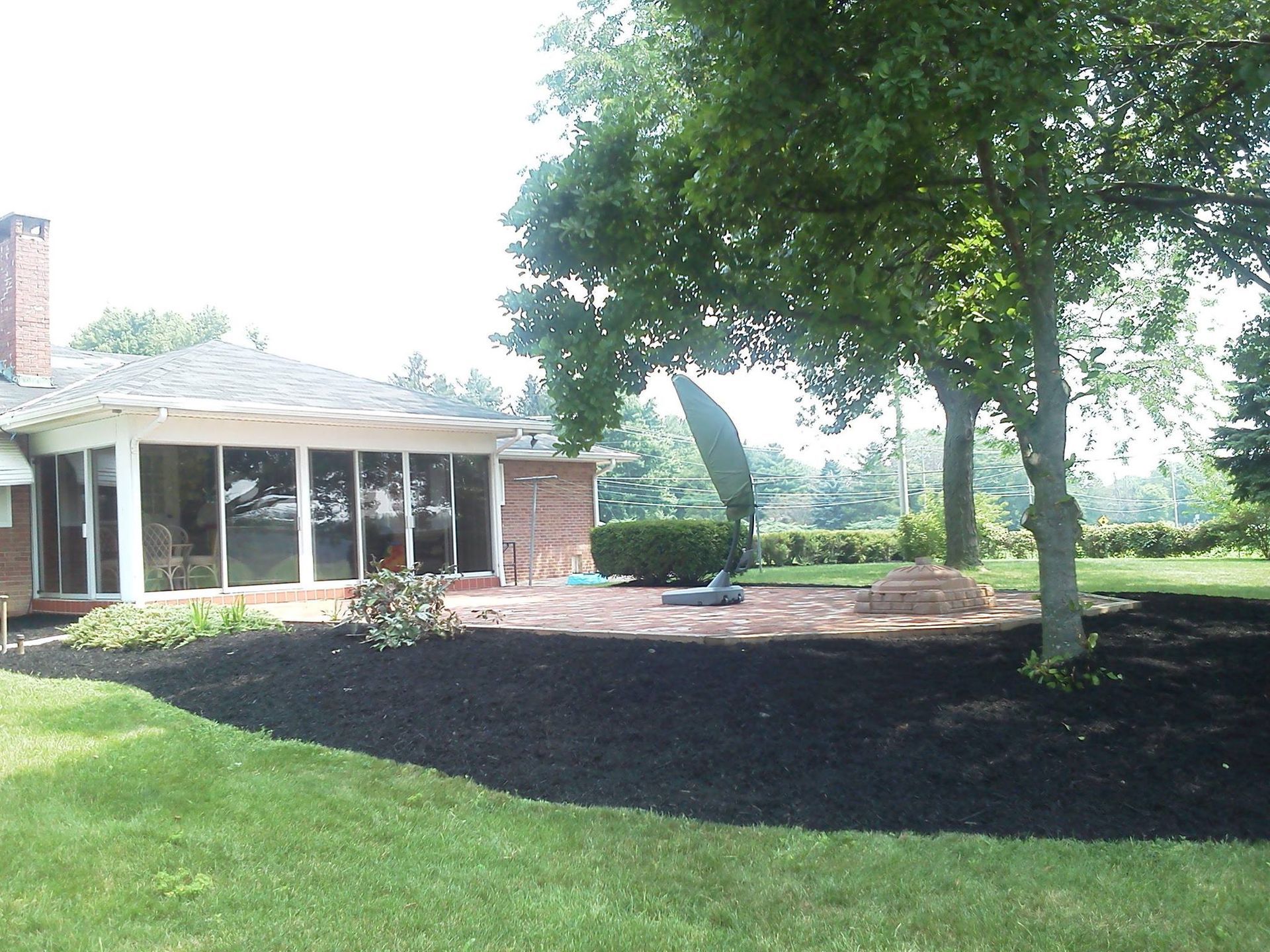 A Big Tree With Black Soil — Powell, OH — Dependable Landscape Services, Inc.