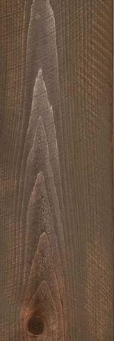 Close-up of a brown wooden surface with visible grain and a knot