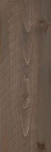 Close-up of a brown wood surface with visible grain and knots