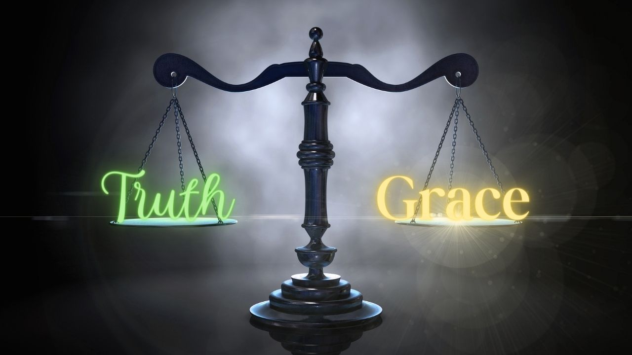 A scale with the words truth and grace on it