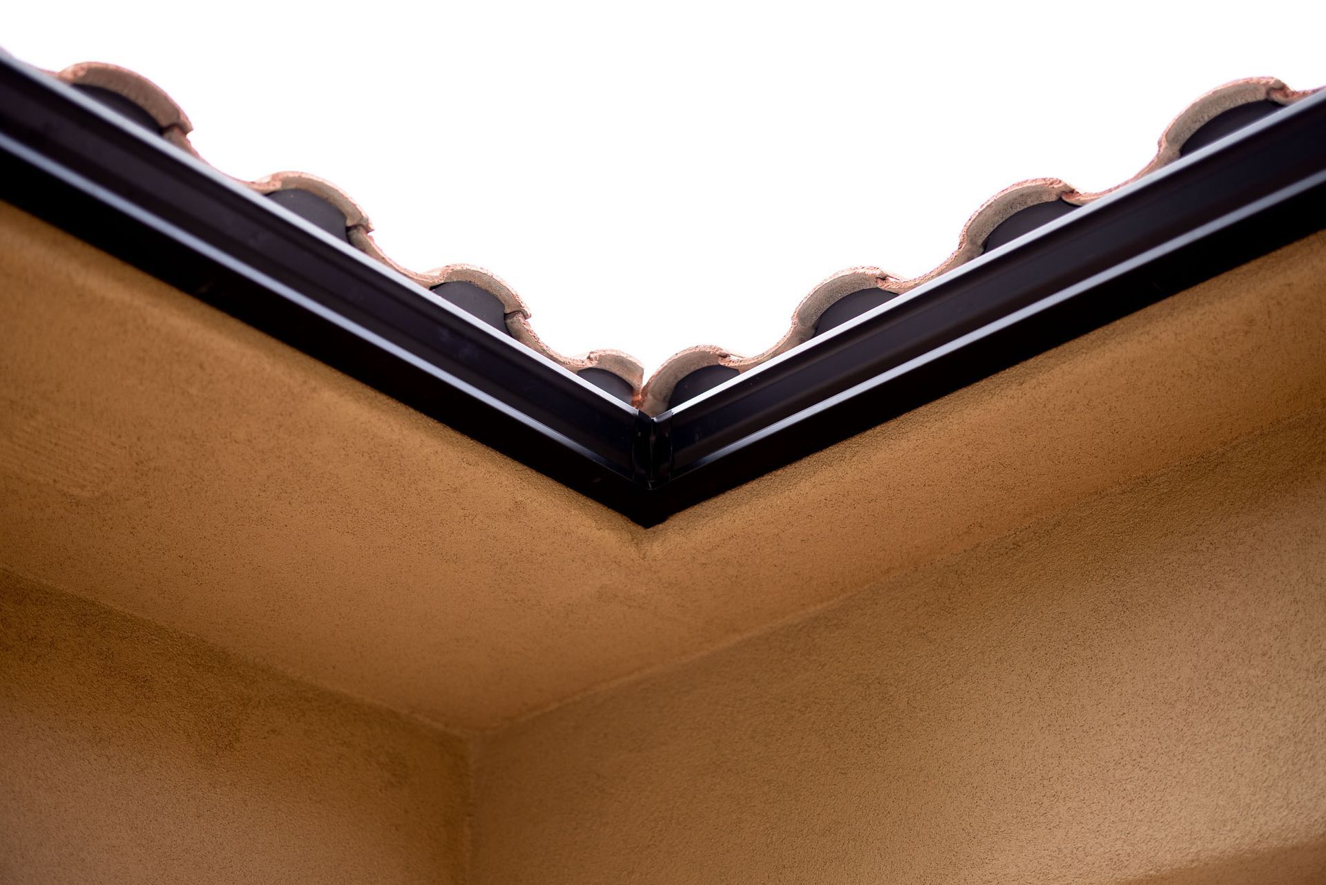 A gutter on a side of a house