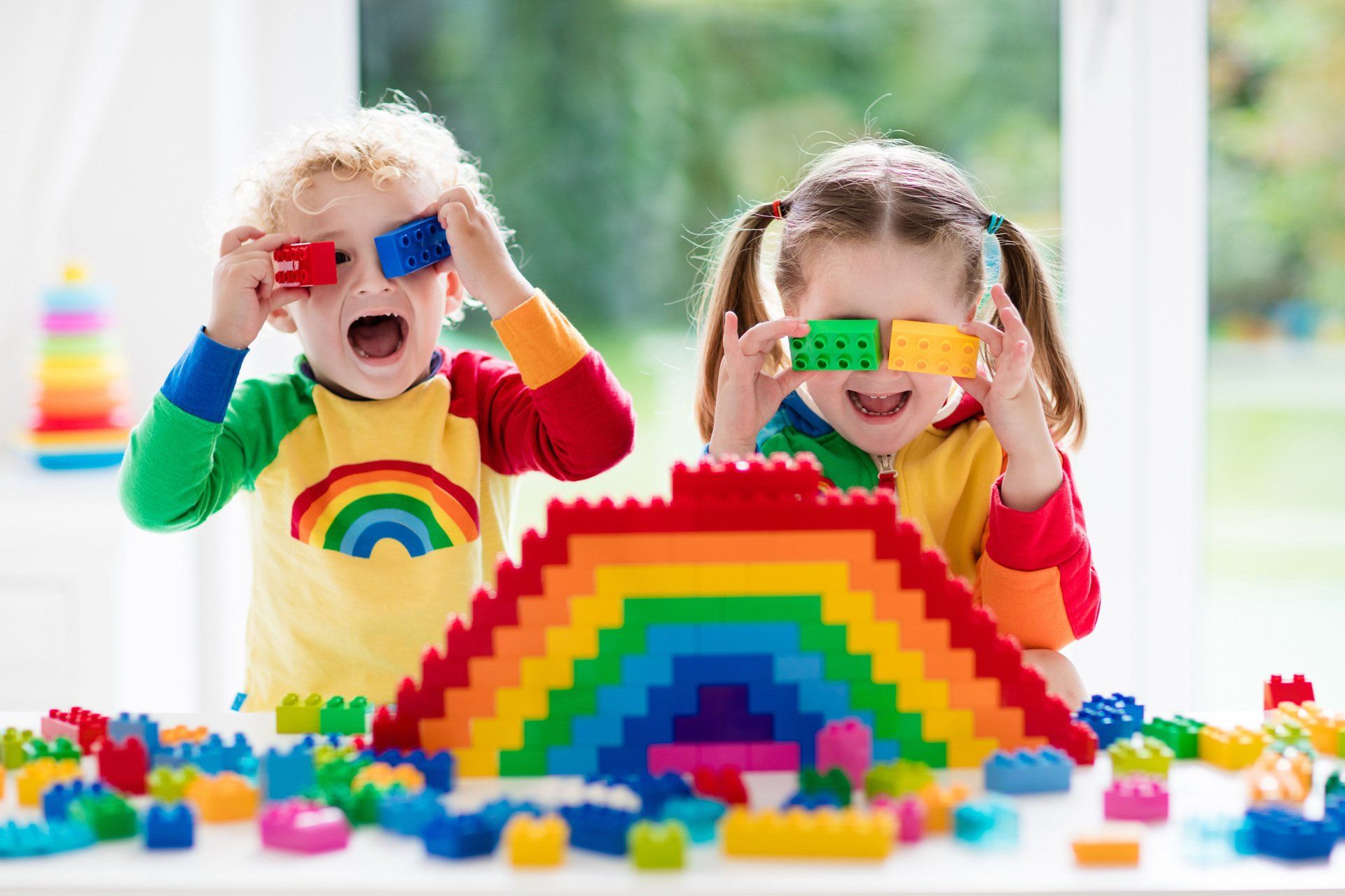 Kids Playing Plastic Building Bricks — Moruya Drive Child Care Centre in Port Macquarie, NSW
