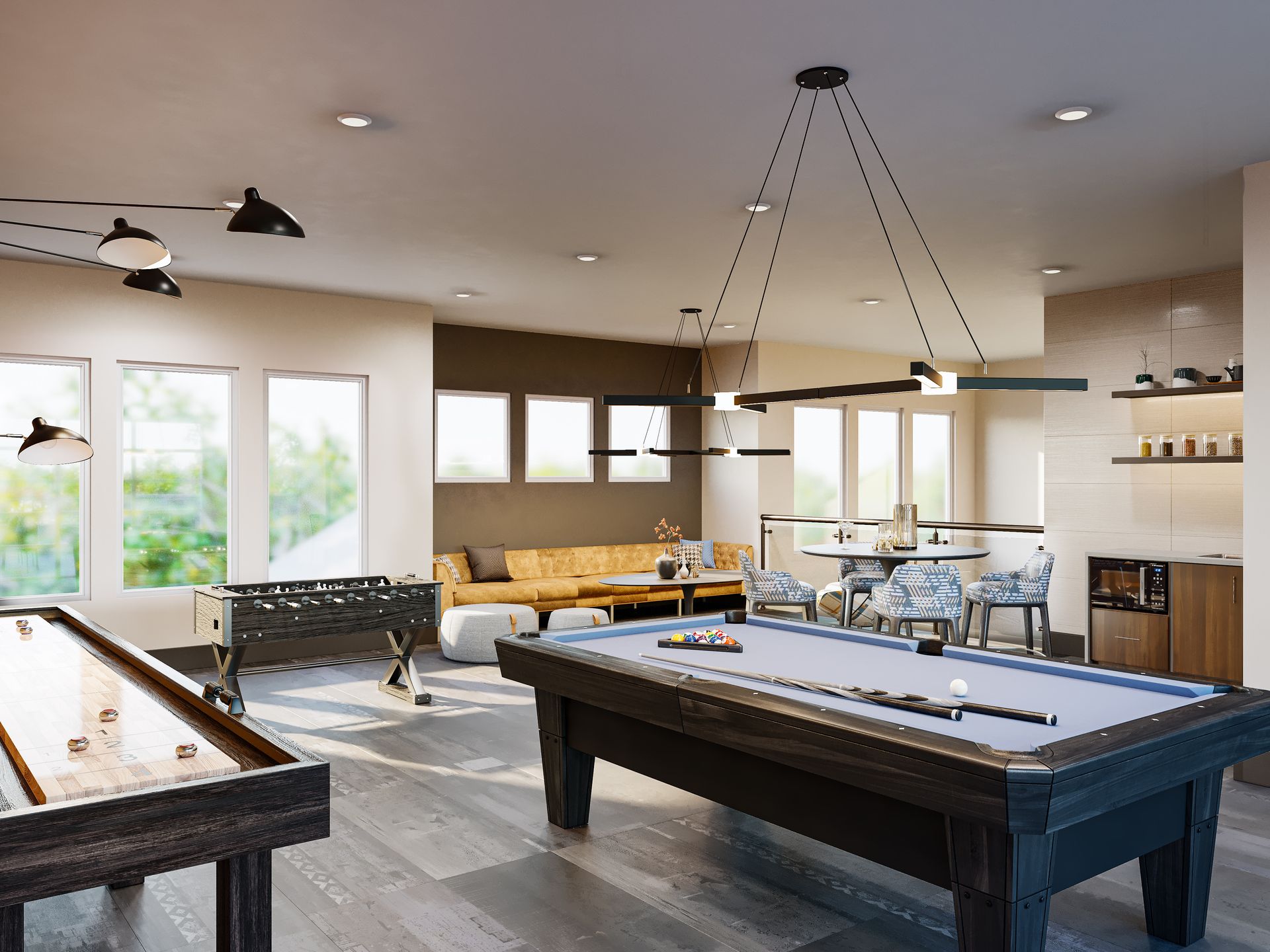 Game room with pool table, shuffleboard, foosball, lounge seating, bar, and large windows.