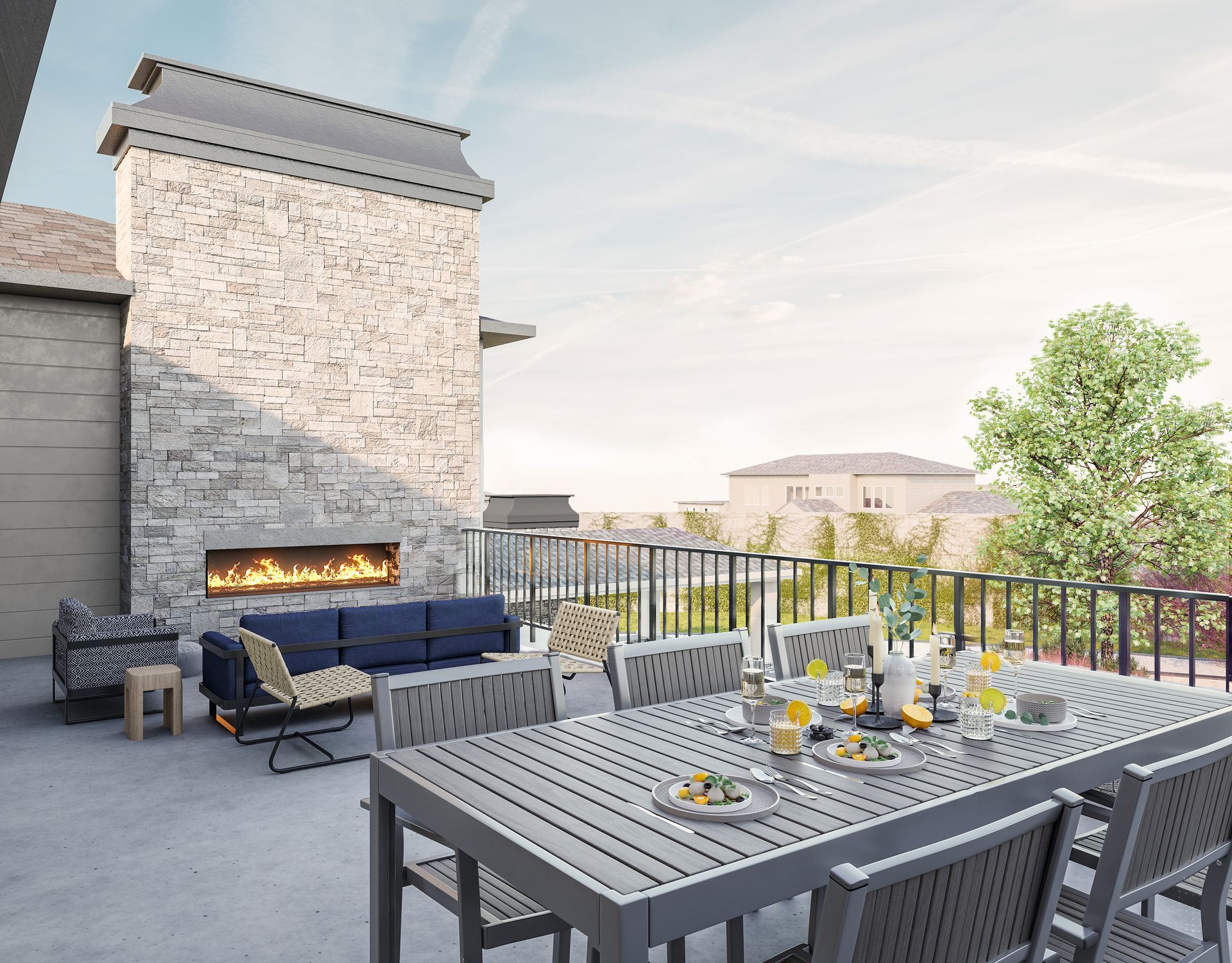 Outdoor patio with dining table, fireplace, and seating.