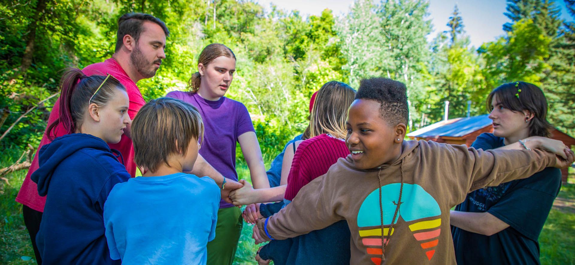 Youth play games at First Baptist Church camp in Utah