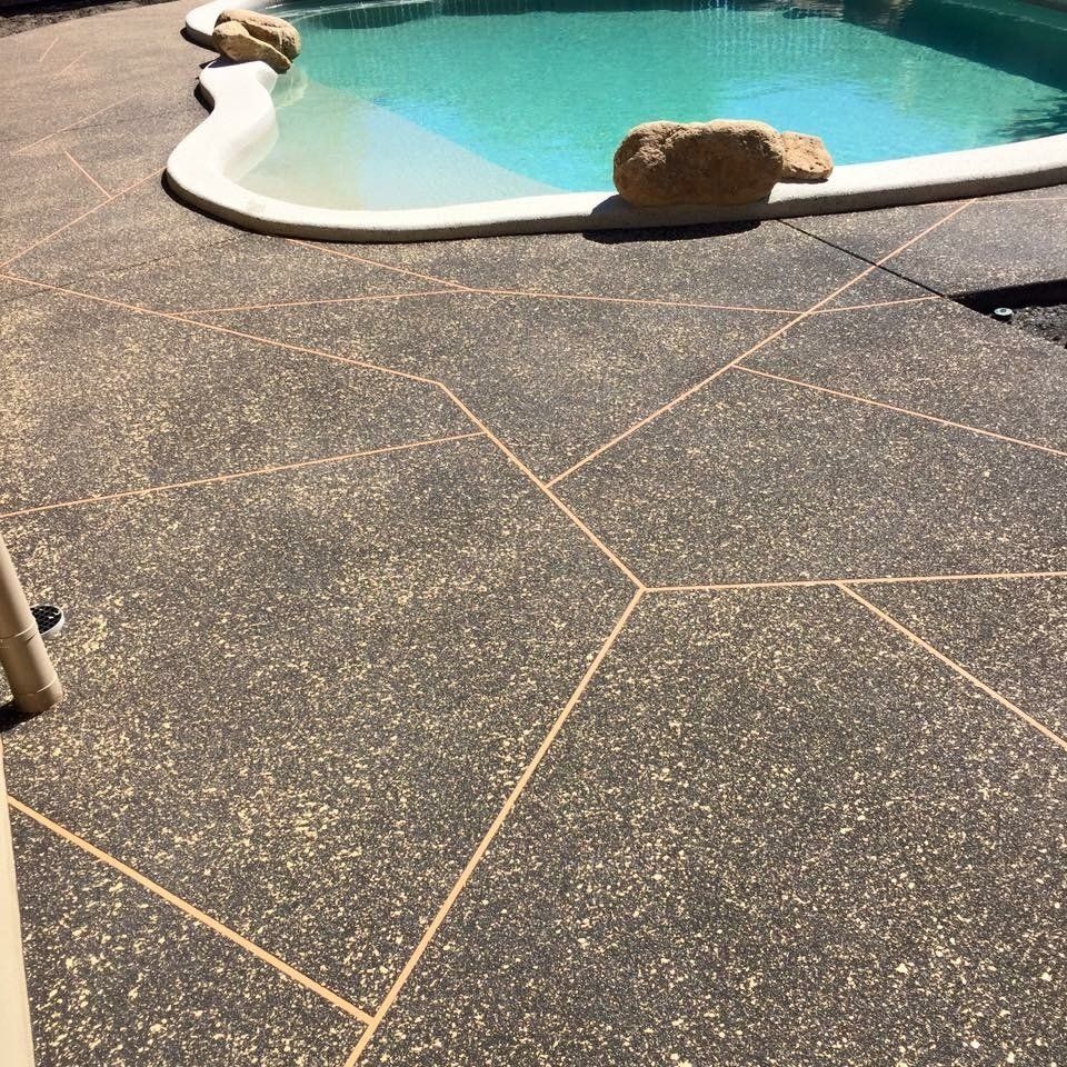 Decorative Stencil Finish on concrete surrounding Pool — Outdoor Concreting in Townsville, QLD