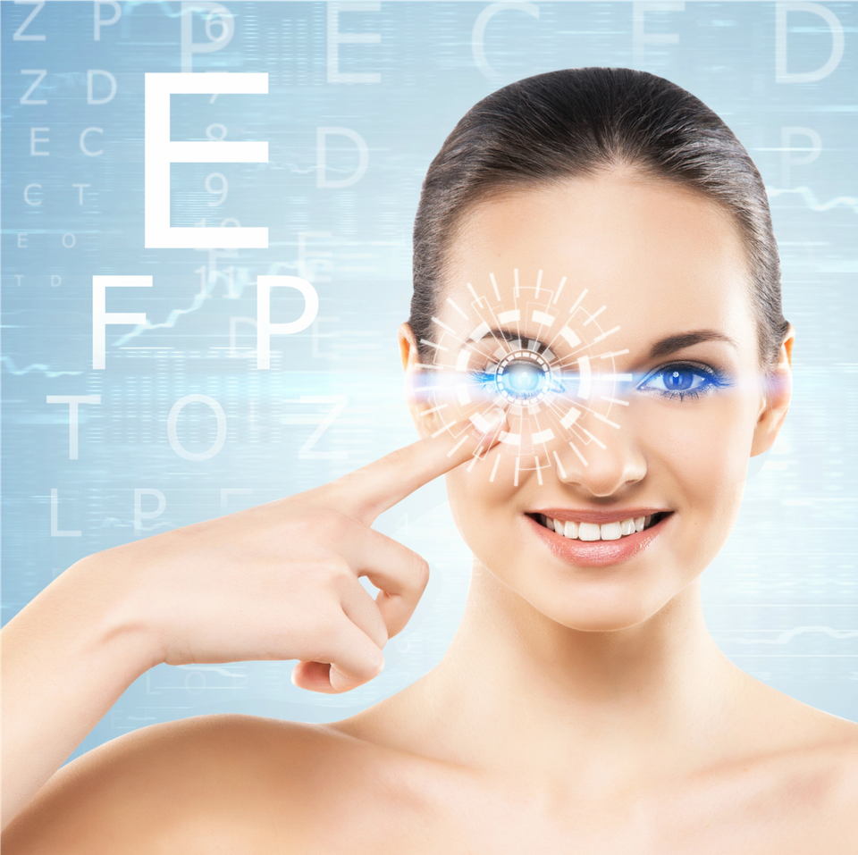 A woman is pointing at her eye with the letter e on it